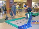 Demo Day - Volunteers works to finish setting up the course